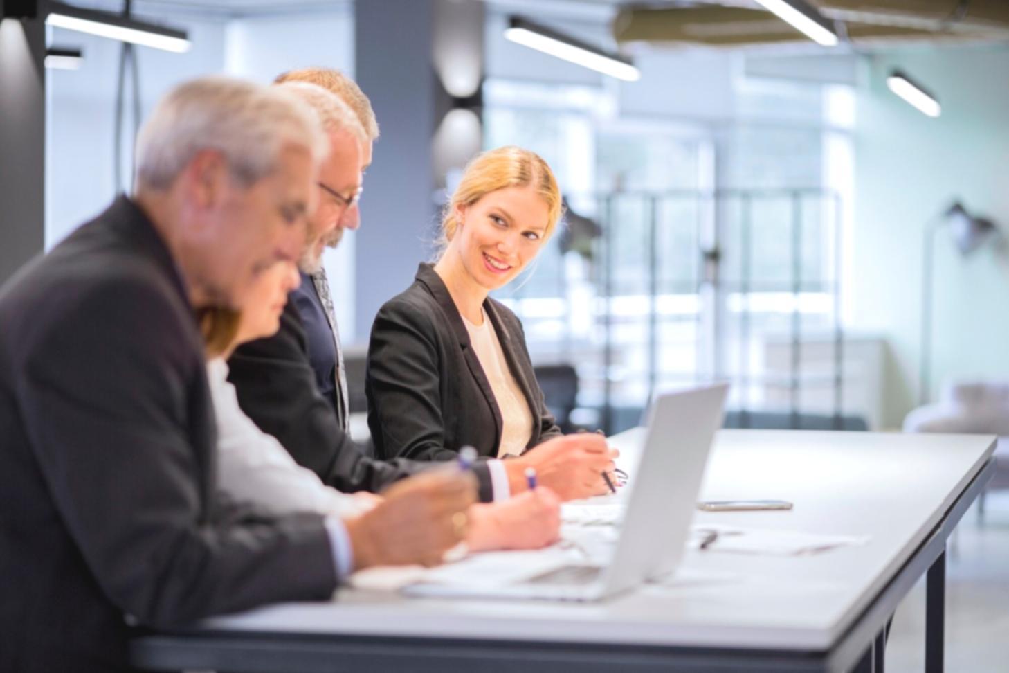 Database team collaboration meeting with performance metrics and optimization strategies
